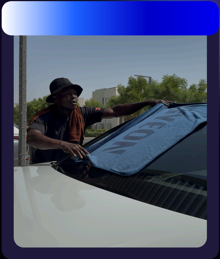 Professional car wash service at luxury venue
